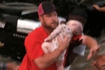 motorists saves life of babies, motorists saves life of babies, heroics of motorists rescues two babies, Texas news