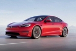 Tesla new electric car breaking news, Tesla new electric car details, tesla to launch electric hatchback without a steering wheel, Tesla new electric car